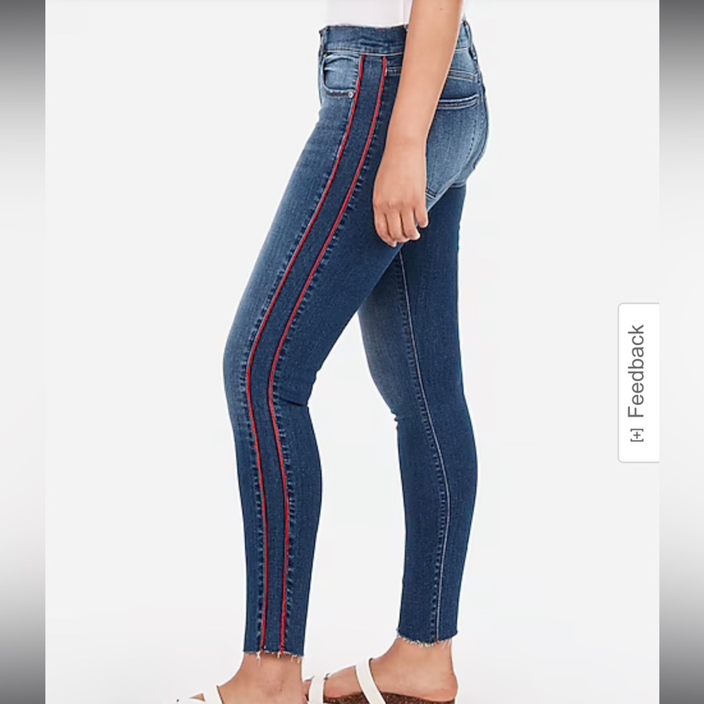 Like New - Express Jeans with red lines.